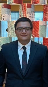 Shayan wearing a suit